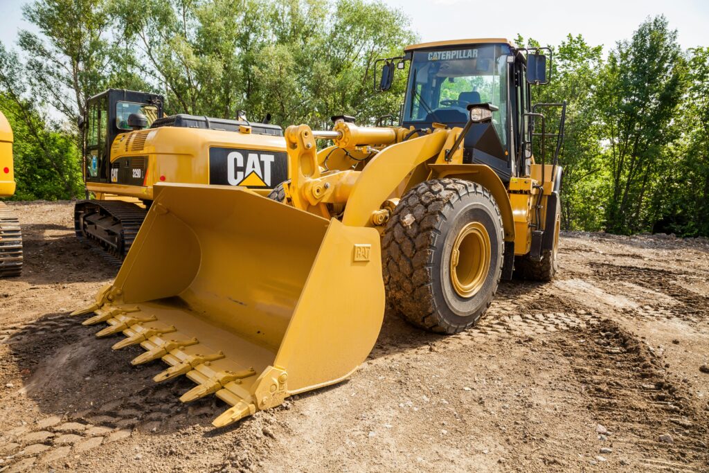 Yellow front loader in a quarry: powerful construction equipment